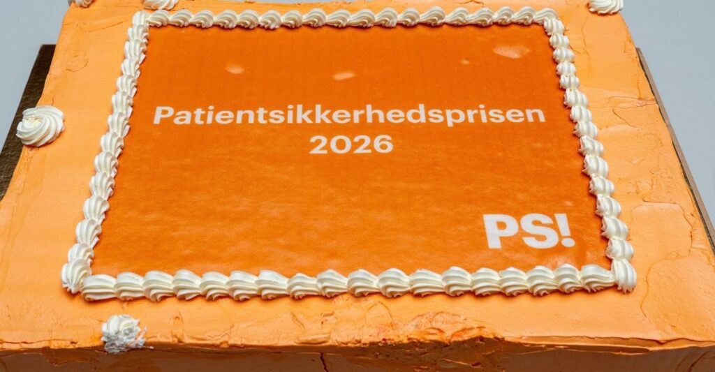 Orange kage påtrykt "Patientsikkerhedsprisen 2026".